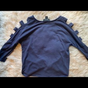 A blue BCX long sleeved top